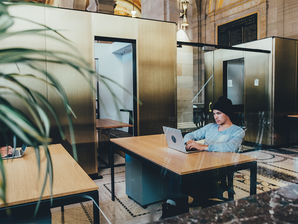 Coworking desks at Crew Collective Cafe